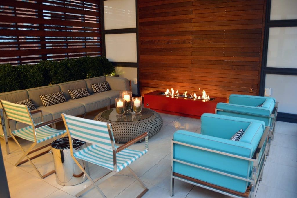 Fire feature at an outdoor patio with seating.