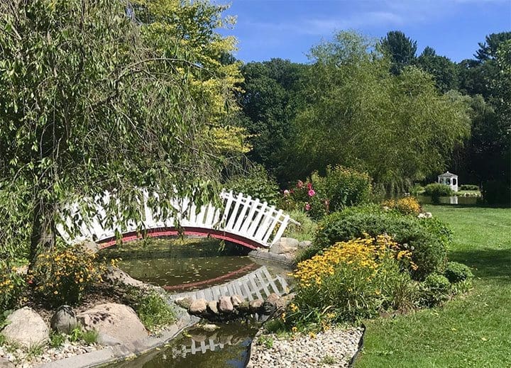 Friendship Garden bridge over a small brook.