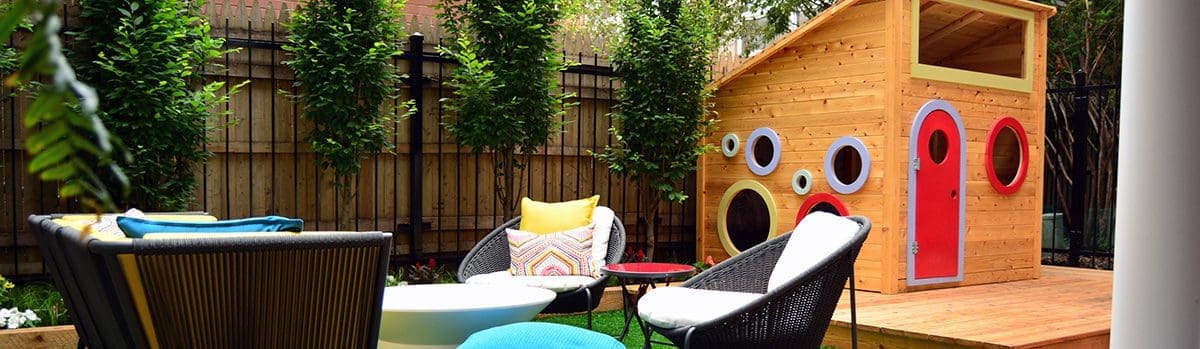 A colorful outdoor play house area for kids.