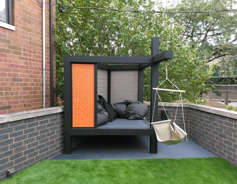Kids' outdoor play area with hammock swing.