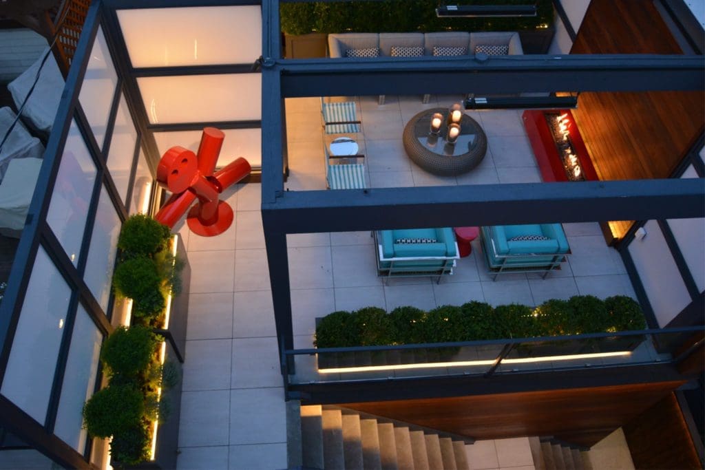 View from above of a patio area with porcelain paving.