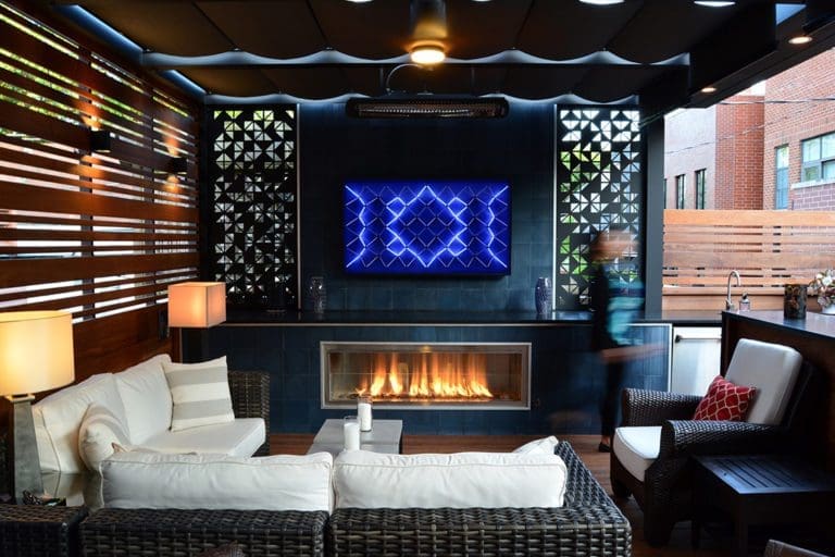 Custom Fire Feature with beautiful privacy screens surrounding.